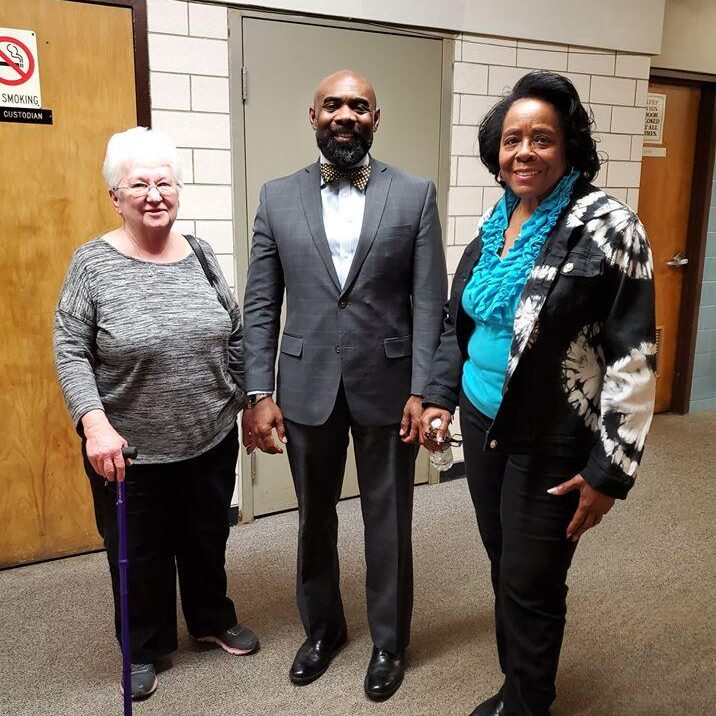 Judge Brooks during his swearing in, where his elementary school principal and teacher surprised him by coming to support their former student. 